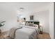 Bedroom featuring a plush bed, and ample natural light at 1765 S Irving St, Denver, CO 80219