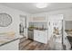 Updated kitchen with stainless steel appliances, modern countertops, and plenty of cabinet space at 4842 Steele St, Denver, CO 80216