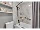 Updated bathroom featuring a tub and tiled surround at 7973 Chase Cir # 56, Arvada, CO 80003