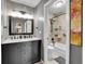 Modern bathroom with marble vanity and tub/shower combo at 7973 Chase Cir # 56, Arvada, CO 80003