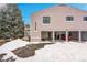 Tan two-story townhouse with attached garage at 7973 Chase Cir # 56, Arvada, CO 80003