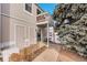 Building exterior showing walkway, landscaping, and private entrance at 7973 Chase Cir # 56, Arvada, CO 80003