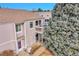 Tan townhouse with private balcony and attached garage at 7973 Chase Cir # 56, Arvada, CO 80003