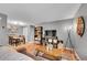 Inviting living room featuring stylish decor, hardwood floors, and a comfortable seating area at 7973 Chase Cir # 56, Arvada, CO 80003