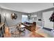Comfortable living room features natural light, hardwood floors, and a brown sofa at 7973 Chase Cir # 56, Arvada, CO 80003