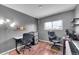 Office with two desks, chairs, and natural light at 7973 Chase Cir # 56, Arvada, CO 80003