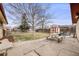 Spacious backyard featuring a picnic table, shed, and partial fencing, perfect for outdoor gatherings at 1308 W 102Nd Ave, Northglenn, CO 80260