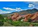 Stunning aerial view of red rocks and a winding road at 1060 Cottonwood Cir, Golden, CO 80401