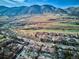 Community overview with golf course and mountain backdrop at 1060 Cottonwood Cir, Golden, CO 80401