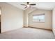 Bright bedroom with carpeted floors and a window at 1060 Cottonwood Cir, Golden, CO 80401