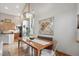 Bright dining area with hardwood floors and a large mirror at 1060 Cottonwood Cir, Golden, CO 80401