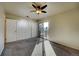 Bedroom with double closets and deck access at 4266 W Pondview Dr, Littleton, CO 80123