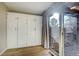 Spacious bedroom closet with built-in shelving and sliding doors at 4266 W Pondview Dr, Littleton, CO 80123