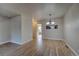 Bright dining area with hardwood floors and access to the patio at 4266 W Pondview Dr, Littleton, CO 80123