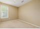 Inviting bedroom with natural light from a window and neutral carpet at 9461 Elmhurst Ln # C, Highlands Ranch, CO 80129