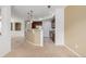 Open living space with a kitchen, bright lighting, modern appliances, and an airy atmosphere at 9461 Elmhurst Ln # C, Highlands Ranch, CO 80129
