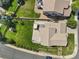 Aerial view of a property showcasing the backyard, garden, and surrounding neighborhood at 8182 Grady Cir, Castle Rock, CO 80108