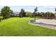 Spacious backyard featuring a well-maintained lawn, playground, and basketball hoop at 8182 Grady Cir, Castle Rock, CO 80108