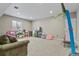 Spacious basement area with recreational features, ideal for entertaining or creating a play area at 8182 Grady Cir, Castle Rock, CO 80108