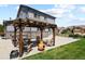 Outdoor pergola with furniture, creating a relaxing backyard space at 8182 Grady Cir, Castle Rock, CO 80108