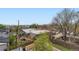 Scenic neighborhood view featuring mature trees and classic architecture under a bright blue sky at 3632 N Pecos St, Denver, CO 80211