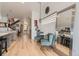 Open-concept dining area with a table, chairs, and a view of the kitchen at 3632 N Pecos St, Denver, CO 80211