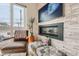 Cozy nook with a fireplace, comfortable seating, and contemporary design at 3632 N Pecos St, Denver, CO 80211