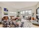 Bright living room featuring large windows and sliding doors that offer a refreshing view at 3632 N Pecos St, Denver, CO 80211