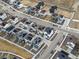 Aerial view of houses with solar panels highlighting a modern residential community and sustainable living at 928 Farrier Ln, Lafayette, CO 80026