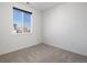 Bedroom with carpet, large window, and bright light at 928 Farrier Ln, Lafayette, CO 80026