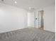 Bright bedroom with neutral carpet and white walls at 928 Farrier Ln, Lafayette, CO 80026