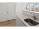 Kitchenette with quartz countertop at 928 Farrier Ln, Lafayette, CO 80026