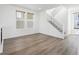 Bright living room with an staircase and wood floors at 928 Farrier Ln, Lafayette, CO 80026