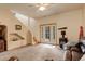 Inviting living room with a fireplace, comfortable seating, and a staircase leading to the upper level at 1353 Elk Valley Dr, Evergreen, CO 80439