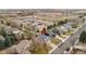 Aerial view of a charming home with lush greenery, mature trees, and a serene neighborhood at 11402 Benton Ct, Westminster, CO 80020