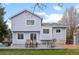 Charming backyard with lush lawn, mature trees, and patio perfect for relaxing or entertaining at 11402 Benton Ct, Westminster, CO 80020
