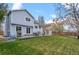 Beautiful backyard featuring a well-manicured lawn, patio area, and privacy fence at 11402 Benton Ct, Westminster, CO 80020