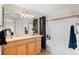 Bright bathroom featuring a vanity, shower, tub, and updated finishes at 11402 Benton Ct, Westminster, CO 80020