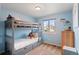 Bright bedroom featuring bunkbeds, a window, and ample space at 11402 Benton Ct, Westminster, CO 80020