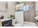 Modern bathroom with a shower-tub combo and updated vanity at 1171 Syracuse St, Denver, CO 80220