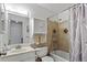 Classic bathroom with tile flooring, a tub and shower combination, and a white vanity at 4194 S Kalispell St, Aurora, CO 80013