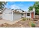 Attractive single-Gathering home with solar panels, showcasing a well-kept lawn and inviting entrance at 4194 S Kalispell St, Aurora, CO 80013