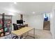 Bright office space has a large desk, shelving, and modern fixtures at 4194 S Kalispell St, Aurora, CO 80013