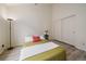 Comfortable bedroom featuring a ceiling fan and large closet at 5465 Zephyr St # 201, Arvada, CO 80002