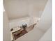 Spacious living area featuring a large window and modern fixtures at 5465 Zephyr St # 201, Arvada, CO 80002