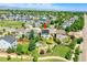 Stunning aerial view of a charming home with solar panels in a serene community near green spaces at 428 Starline Ave, Lafayette, CO 80026