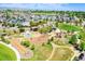Picturesque aerial shot of a neighborhood park with playgrounds, green spaces, and community gathering spots at 428 Starline Ave, Lafayette, CO 80026