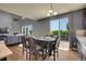 Bright dining area with a sliding glass door to the deck, seamlessly connecting indoor and outdoor spaces at 428 Starline Ave, Lafayette, CO 80026
