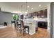 Spacious kitchen with an island, breakfast bar, modern appliances, and ample counter space for cooking and entertaining at 428 Starline Ave, Lafayette, CO 80026