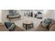 Spacious finished basement with a large seating area and home gym setup at 17326 W 57Th Ave, Golden, CO 80403